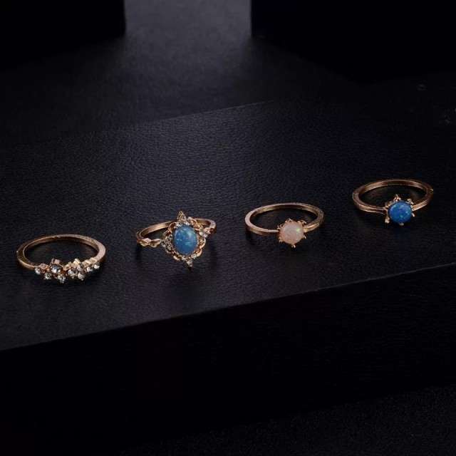 Komplet 4 prstanov v modro-zlati barvi 
