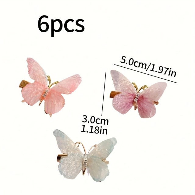 Komplet 6 pisanih sponk za lase v obliki metuljčka