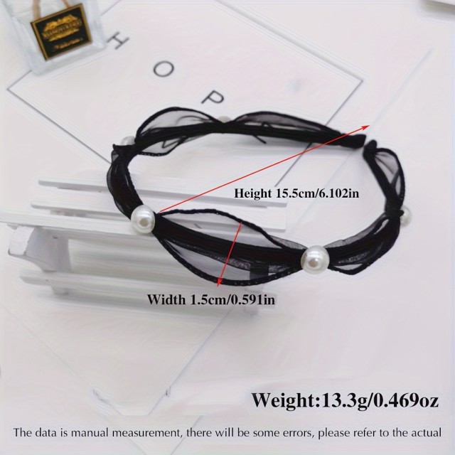 Eleganten okrasni naglavni trak z biserčki