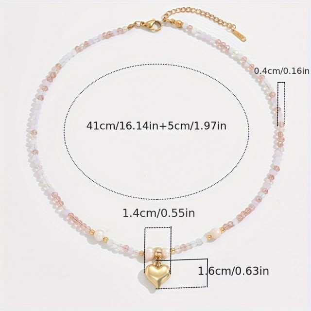 Elegantna ogrlica s perlicami in zlatim srcem