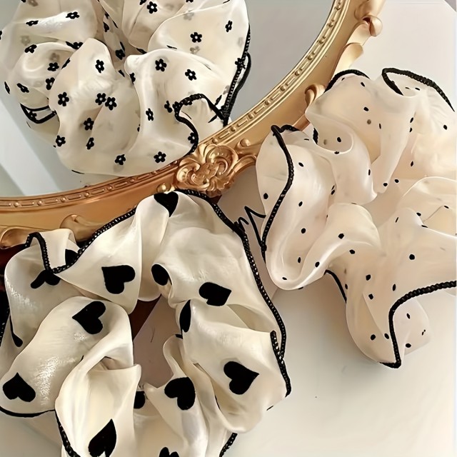 Komplet 3 črno-belih gumic za lase