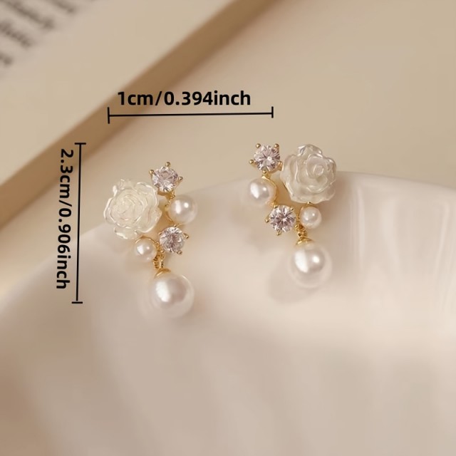 Ženski elegantni uhani s cvetličnim vzorcem 