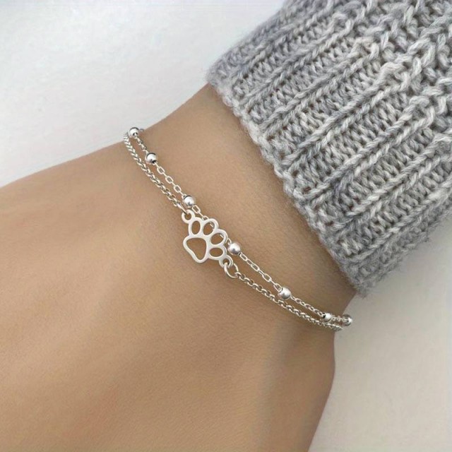 Dvodelna zapestnica s tačko v srebrni barvi