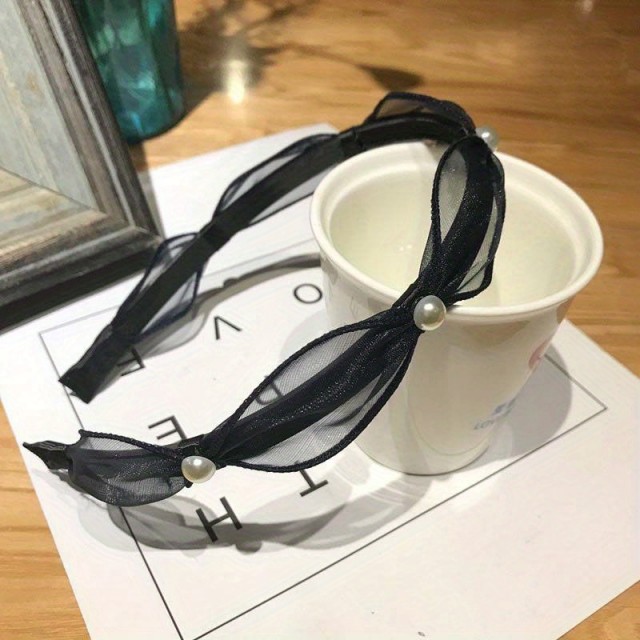 Eleganten okrasni naglavni trak z biserčki