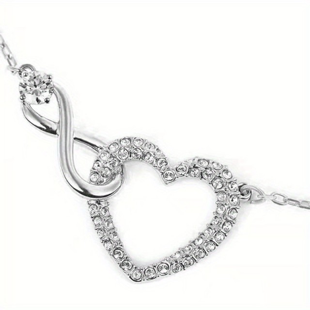 Elegantna ogrlica z obeskom srca in znaka neskončnosti
