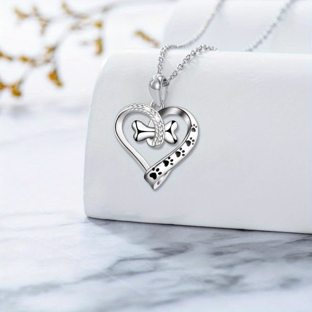 Verižica v obliki srca s kostjo 