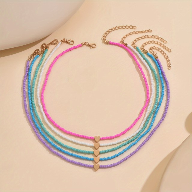 Poletni komplet petih pisanih ogrlic iz perlic s srčki