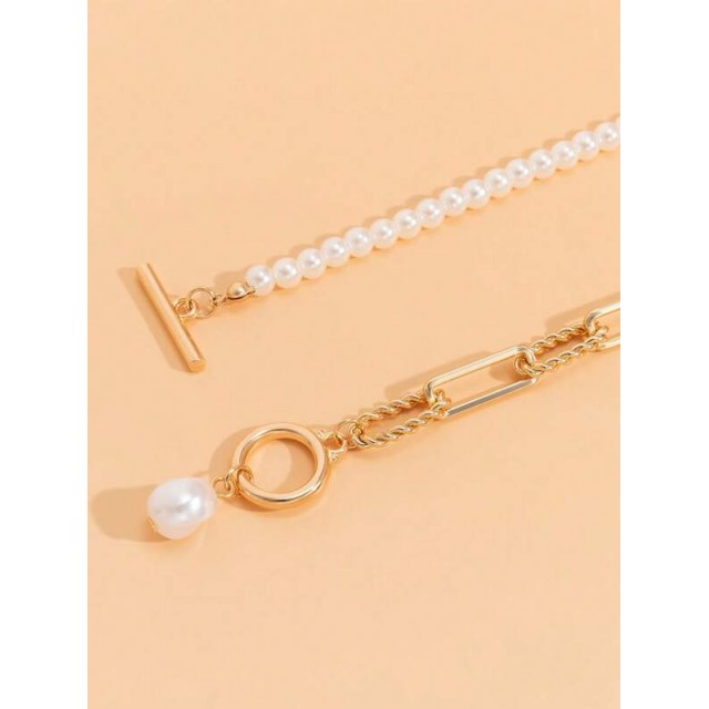 Dvodelna zlata ogrlica s perlico 