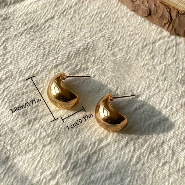 Elegantni zlati uhani v obliki kapljice