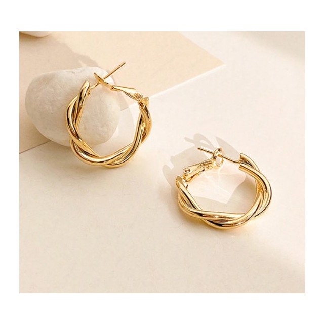 Elegantni pleteni okrogli uhani