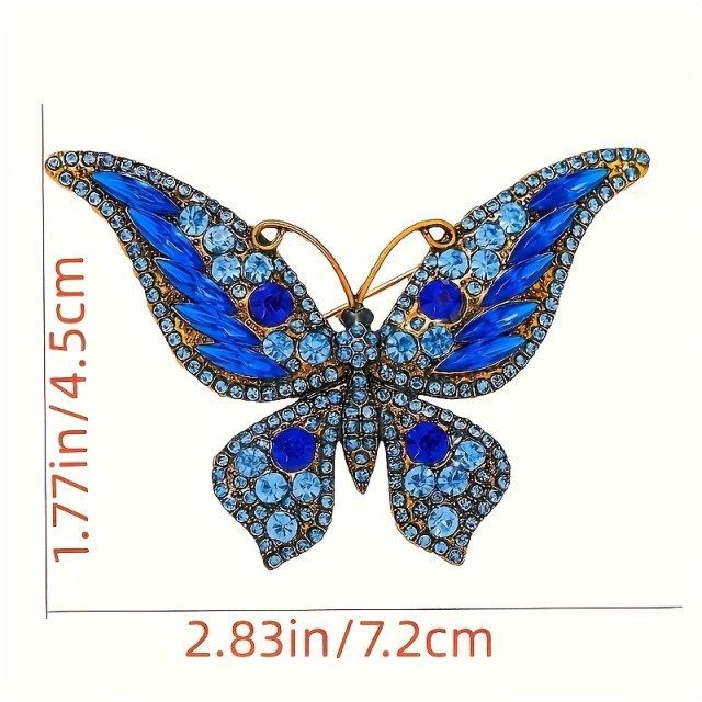 Sofisticirana modra broška v obliki metulja