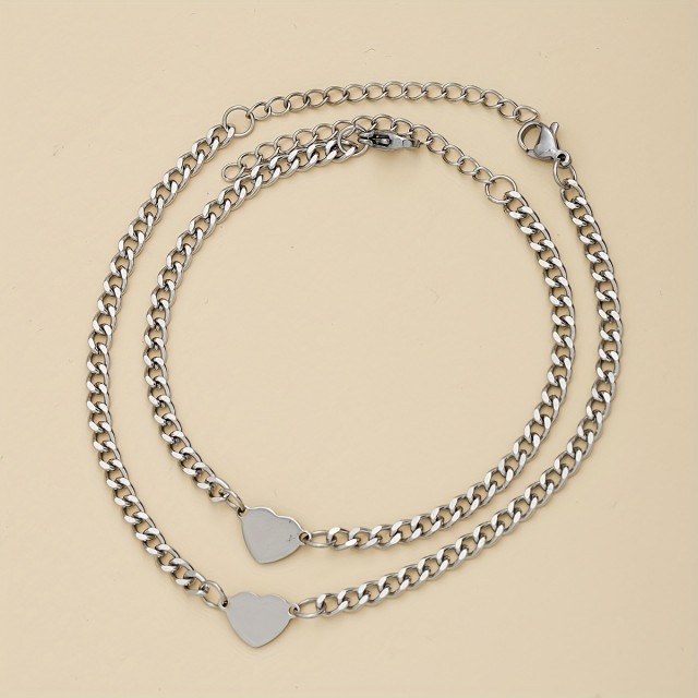 Komplet 2 zapestnic za par iz nerjavečega jekla v obliki srca