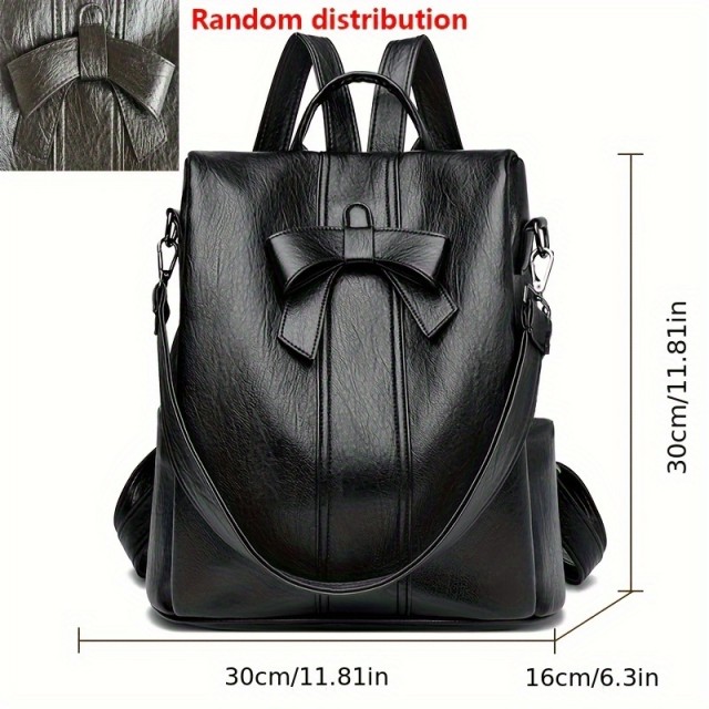 Čudovit nahrbtnik v črni barvi s pentljo