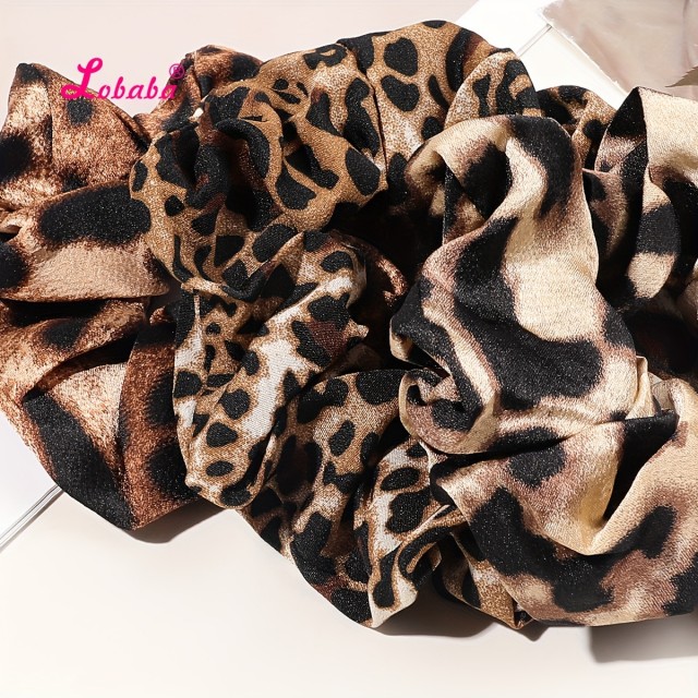 Komplet 3 elastik za lase z leopardjim vzorcem