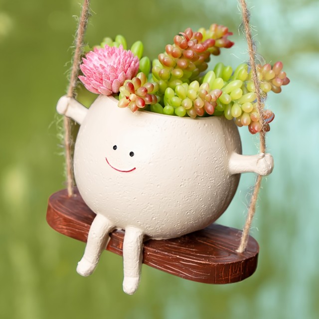 Cvetlični lonček NASMEJANA DEKLICA NA GUGALNICI