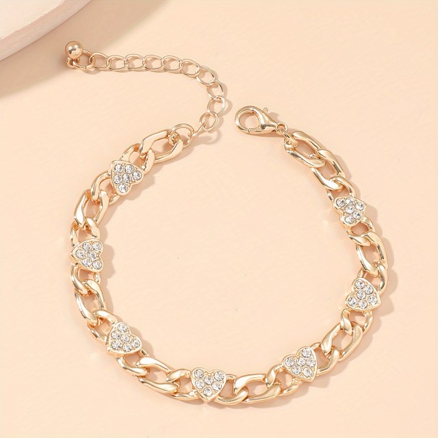 Zapestnica z bleščečimi srčki – srebrna ali rose zlata barva