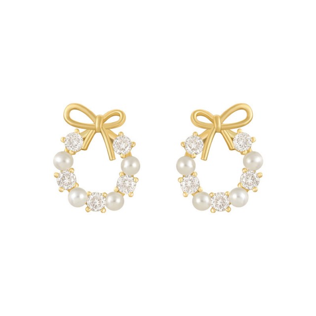 Uhani v zlati barvi s pentljico