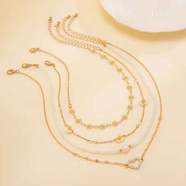 4 delni set pomladnih ogrlic z marjeticami