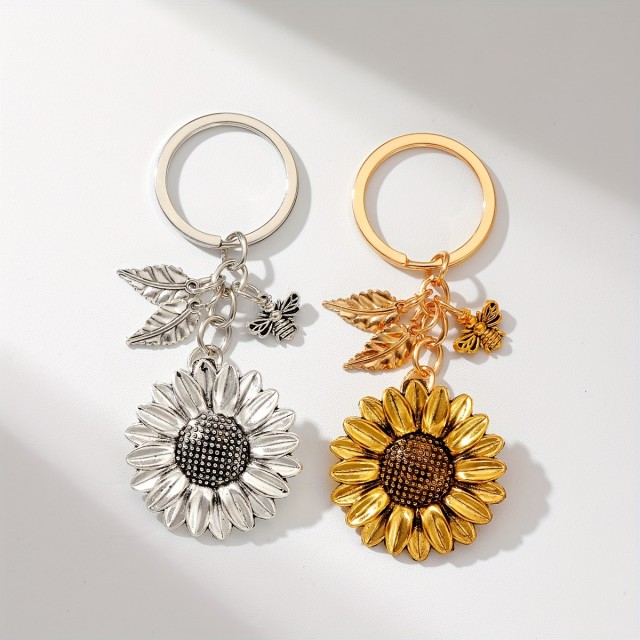 Obesek za ključe v zlati barvi sončnica