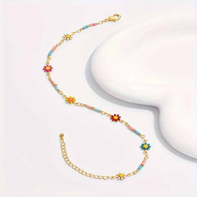 Barvita boho zapestnica za nogo z marjeticami 