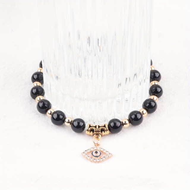 Zaščitna zapestnica z obeskom 