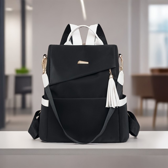 Elegantni črno bel nahrbtnik z nastavljivimi naramnicami