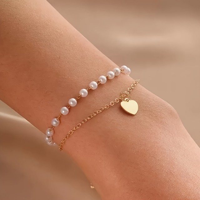 Personalizirana zapestnica s perlicami in obeskom srca 