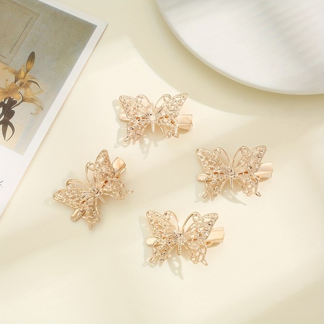 4 kosi srčkanih sponk za lase z zlatim metuljčkom