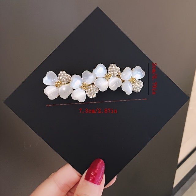 Čudovita okrasna sponka za lase štiriperesne deteljice