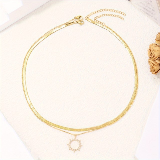 Dvojna elegantna ogrlica v zlati barvi sonce