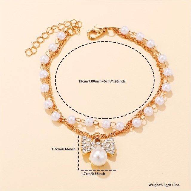 Elegantna zapestnica za nogo s perlicami in pentljo