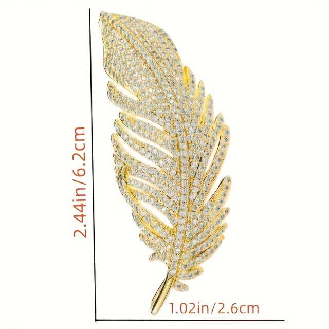 Elegantna broška v srebrni barvi z obliko peresa