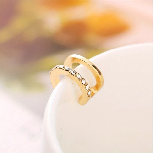 Enojni uhan s cirkoni v 2 barvah (luknjice niso potrebne)