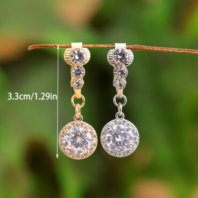 Fake piercing za popek s tremi cirkoni in okroglim obeskom