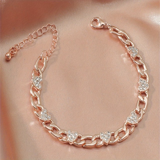 Zapestnica z bleščečimi srčki – srebrna ali rose zlata barva