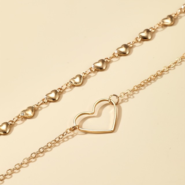 Dvojna zlata zapestnica za gleženj s srčki