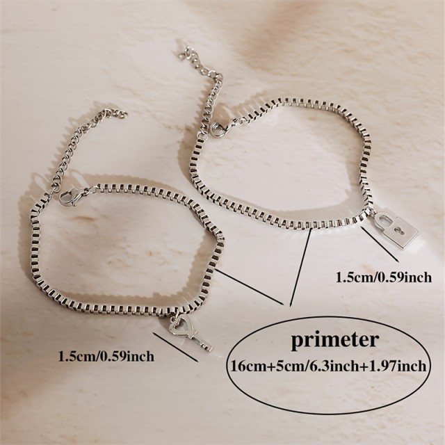 Komplet 2 zapestnic za pare s ključavnico in ključkom