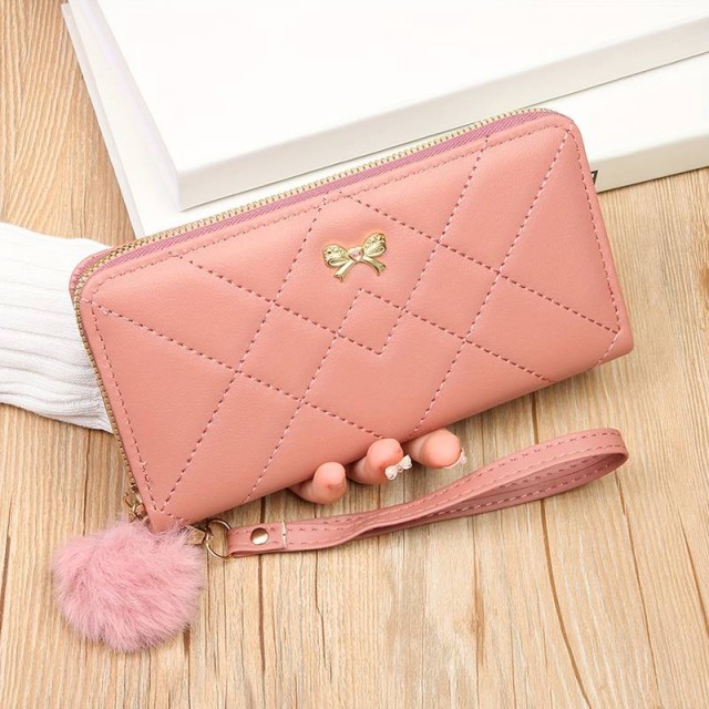 Modna ženska denarnica v roza barvi s pentljico