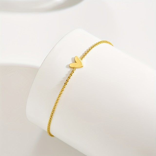 Preprosta zlata zapestnica s srcem