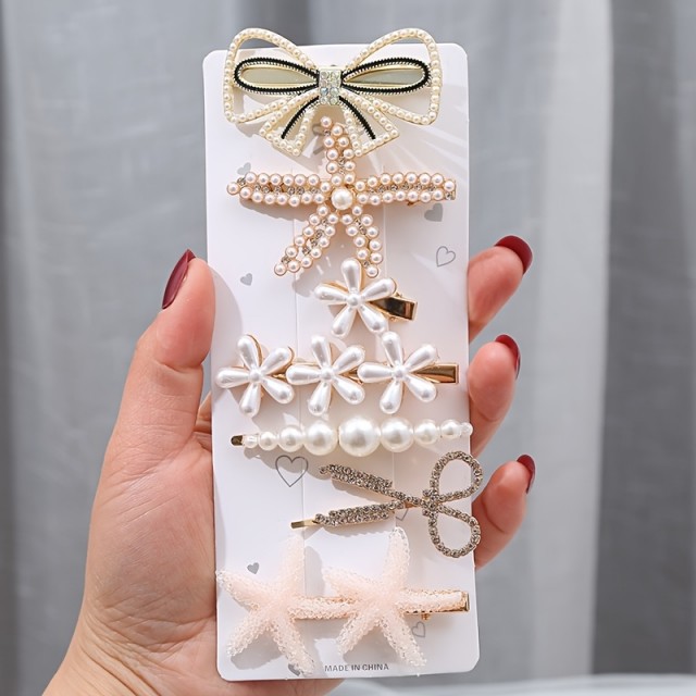 Komplet 7 kosov ženskih elegantnih sponkic za lase