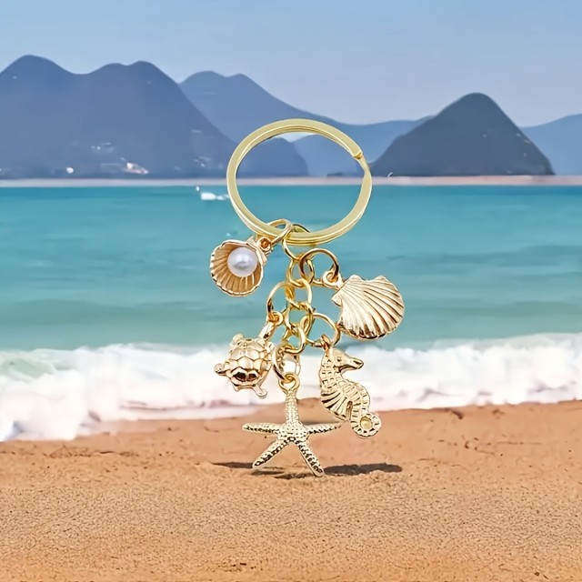 Zlat obesek za ključe z morskim motivom