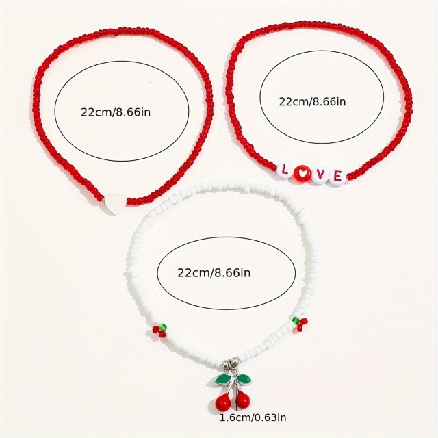 Komplet 3 zapestnic za nogo s češnjami in LOVE napisom