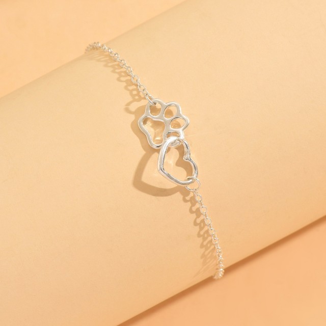 Zapestnica za nogo s tačko in srcem srebrne barve