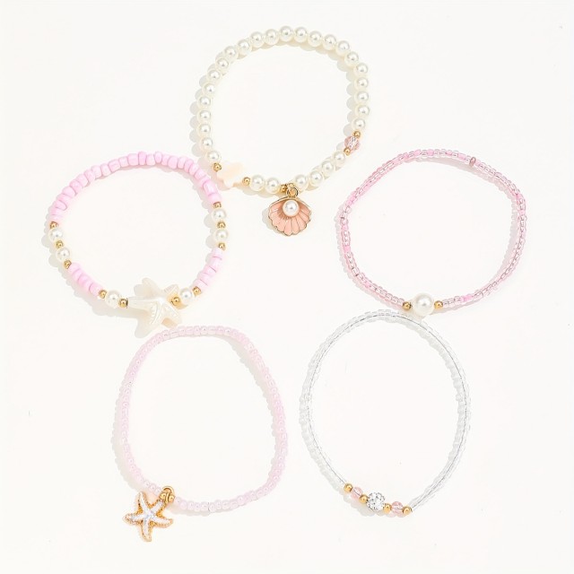 5 delni boho set zapestnic v roza barvi s školjkami
