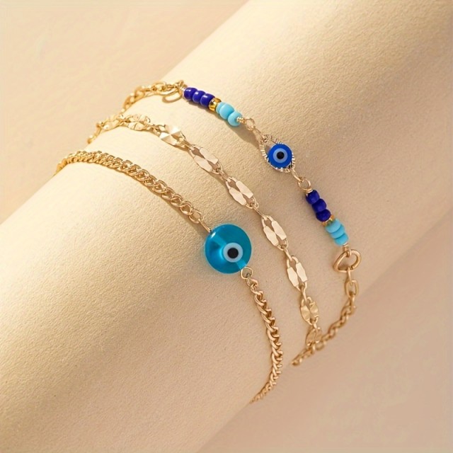 Komplet 3 zapestnic za nogo z modrim zaščitnim očesom in zlato verižico