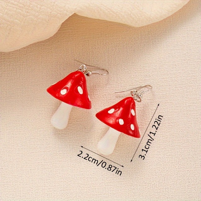 Prikupni uhani v obliki mušnic