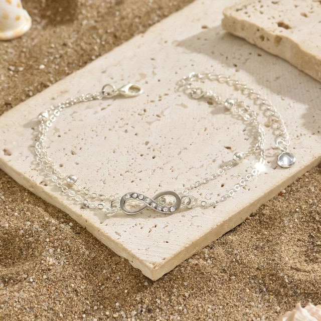 Zapestnica za nogo srebrne barve infinity obesek