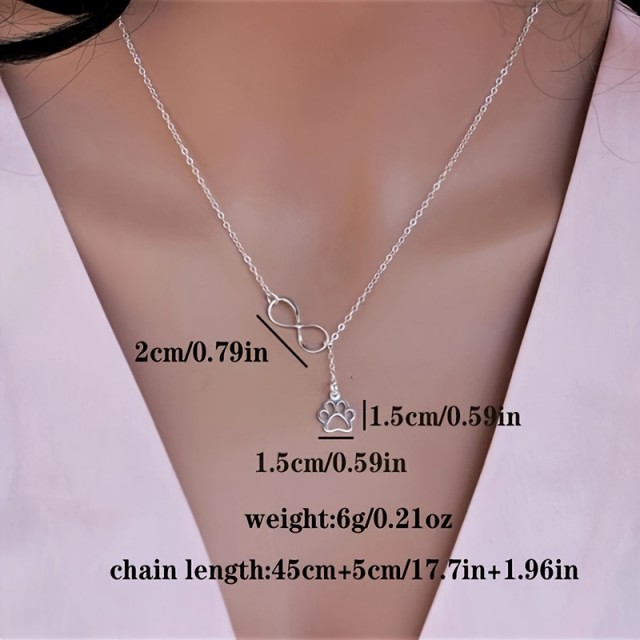 Verižica z znakom neskončnosti in tačke v srebrni barvi