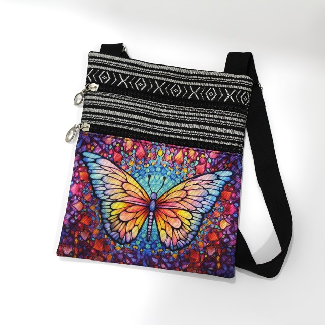 Majhna etno torbica čez rame s pisanim metuljem 