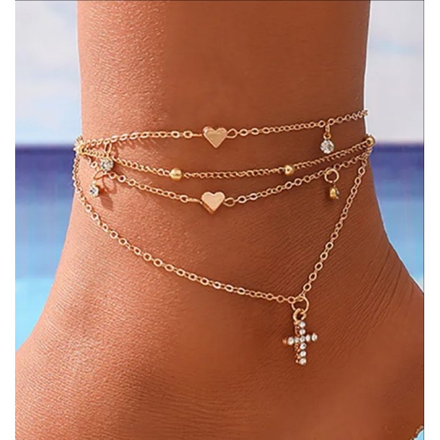 Komplet zapestnic za nogo zlate barve, s križom